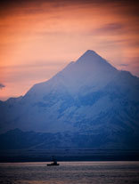 photo with view of sunset and Mt. St. Elias in Yakutat, Alaska.