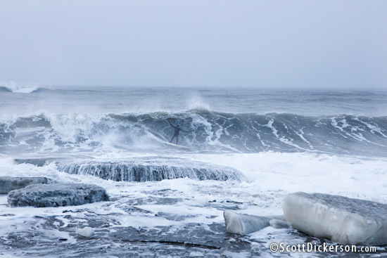 Mike McCune surfing Alaska in a winter blizzard.