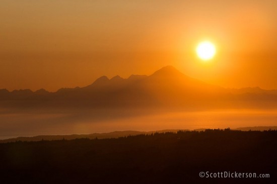 Aerial photograph of a sunset over Cook Inlet, Alaska.