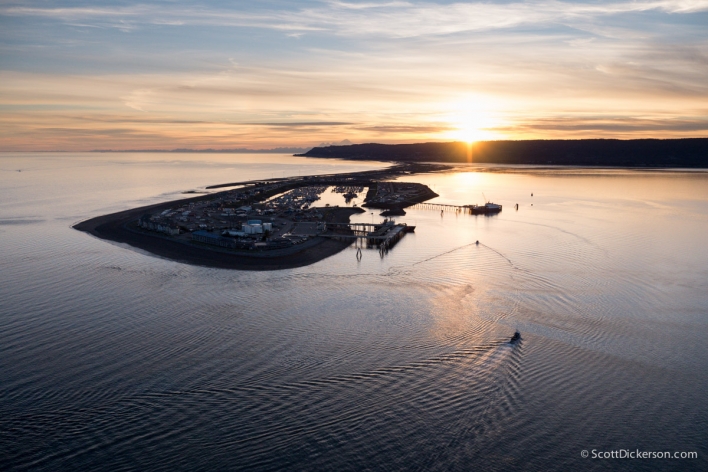 Aerail of Homer Spit and Kachemak Bay at sunset.