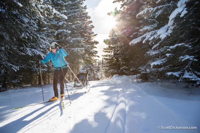 Stephanie Dickerson takes baby Riley out nordic skiing near Homer, Alaska on a sunny winter day.