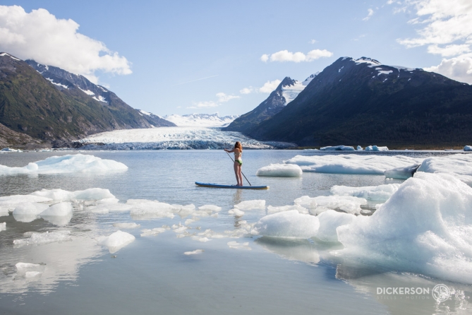 Stand up paddling by Spencer glacier in Alaska