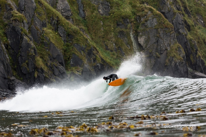 Dan Malloy surfing in Alaska from the m/v Milo